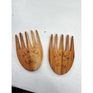 Alaska hands salad tossing forks
